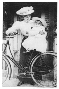 Mother and Child on a Bicycle by English Photographer